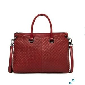Charles Jourdan quilt-embossed leather bag.